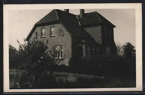 Foto-AK Hohenkirchen /Oldenburg, Partie an einer Villa, 1933