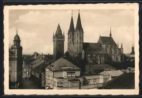 AK Kolín, Strassenpartie mit Kirche