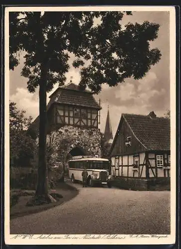 AK Neustadt / Harz, NWE-Bus am Tor in der Stadt