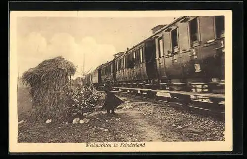 AK Wächter an den Bahngleisen zu Weihnachten, eine Militärbahn fährt vorbei