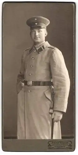 Fotografie Atelier Hüseler, Schleswig, Soldat in Uniform Rgt. 87 mit Bajonett und Portepee