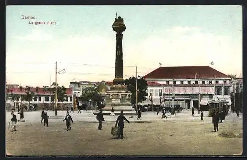 AK Damas, La grande Place, Denkmal und Strassenbahn