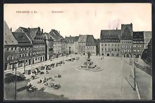 AK Freiberg in Sa., Obermarkt mit Denkmal und Geschäften