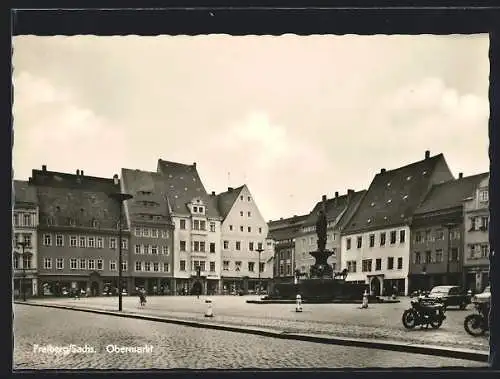 AK Freiberg /Sachs., Obermarkt mit Denkmal und Geschäften