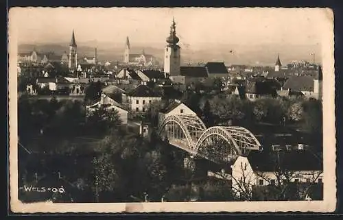 AK Wels, Blick über die Stadt mit Brücke und Kirchen