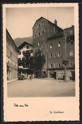 AK Zell am See, Strassenpartie mit Geschäften und Hotel Lebzelter