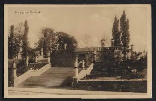 Siegelmarken-AK Freiburg i. Br., Aufgang zum Stadtpark, rückseitig drei Siegelmarken mit Ansichten Rathaus etc.