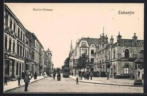 AK Eschweiler, Marien-Strasse mit Geschäft und Litfasssäule, Strassenbahn