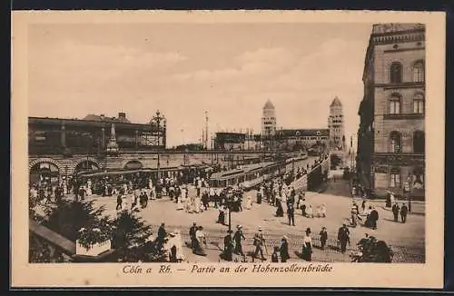 AK Köln a. Rh., Strassenpartie mit Hohenzollernbrücke und Strassenbahn