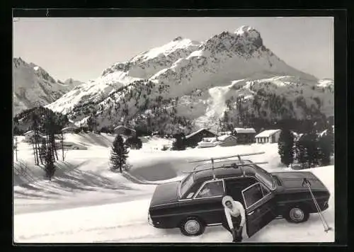 AK Auto der Marke Ford im verschneiten Gebirge