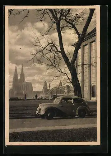 AK Köln a. Rh., Ford-Taunus am dem Dom gegenüberliegenden Rheinufer