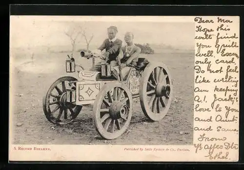 AK Auto aus Holz des Zulu Motor Club, zwei Einheimische am Steuer