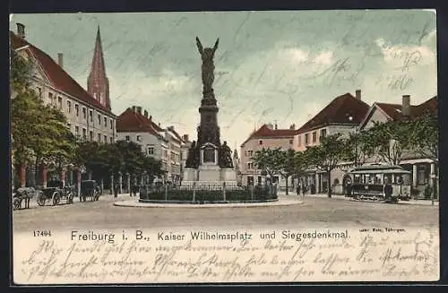 AK Freiburg, Kaiser Wilhelmsplatz mit Siegesdenkmal und Strassenbahn