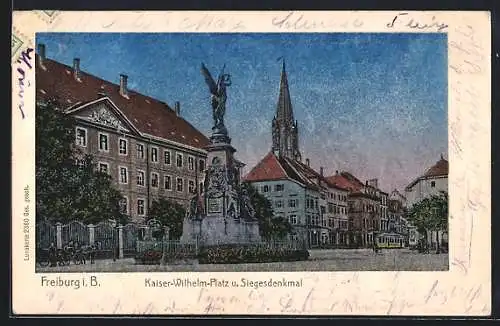 Luna-AK Freiburg i. B., Kaiser-Wilhelm-Platz mit Siegesdenkmal und Strassenbahn