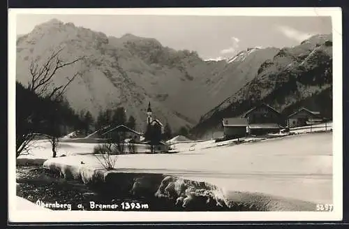 AK Obernberg a. Brenner, Ortsansicht im Schnee