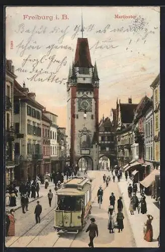 AK Freiburg i. B., Martinstor und Kaiserstrasse mit Strassenbahn