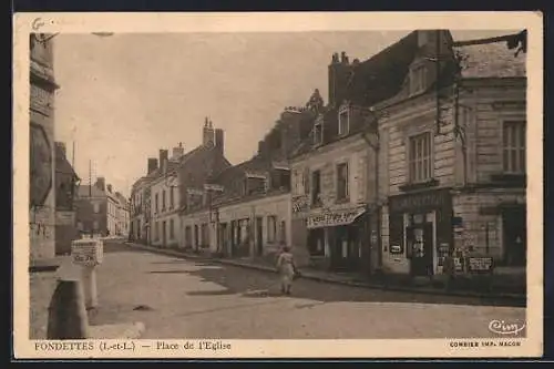 AK Fondettes, Place de l`Eglise avec des commerces et une personne marchant sur la rue