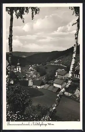 AK Oberwarmensteinach, Teilansicht mit der Kirche durch Birken hindurch