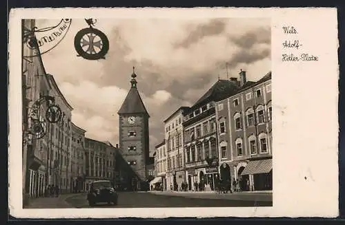 AK Wels, Platz mit Gasthaus und Geschäften