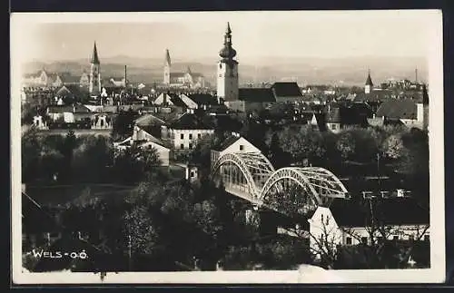 AK Wels, Blick über die Stadt mit Brücke und Kirchen