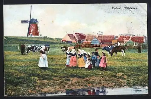 Künstler-AK Photochromie Nr. 2958: Walcheren /Zeeland, Ortspartie mit Windmühle, Kühen und Kindern