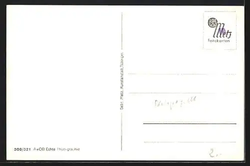 AK Freiburg i. Br., Strassenpartie mit Geschäften und Passanten