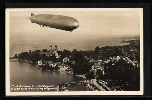 AK Friedrichshafen, Luftschiff Graf Zeppelin über dem Bodensee