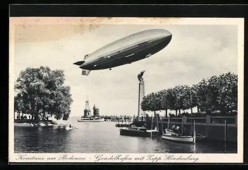 AK Konstanz am Bodensee, Zeppelin Hindenburg über dem Gondelhafen