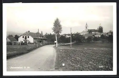 AK Putzleinsdorf /O. Oe., Strassenpartie mit Kirche