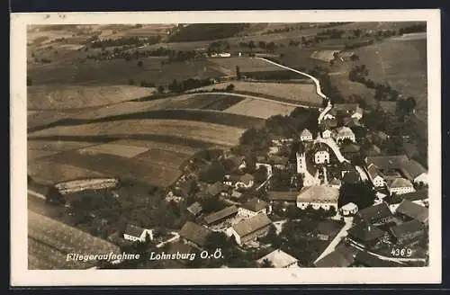 AK Lohnsburg /O.-Ö., Teilansicht mit Kirche, Fliegeraufnahme