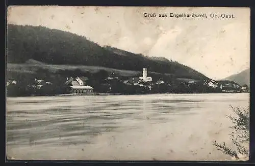 AK Engelhartszell /Ob.-Oest., Uferpartie mit Kirche