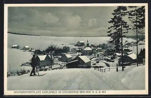 AK Carlsfeld im Erzgebirge, Wintersportplatz mit Blick auf die Häuser