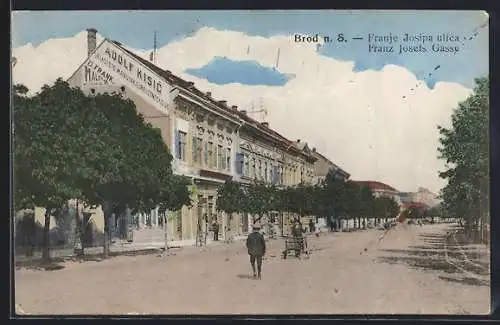 AK Brod n. S., Franz Josefs Gasse mit Geschäft von Adolf Kisic