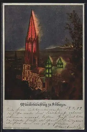 AK Freiburg i. Br., Beleuchtetes Münster mit Panorama