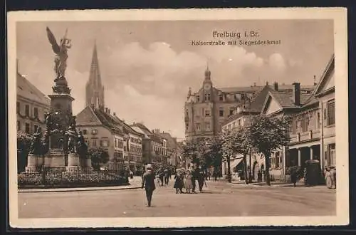 AK Freiburg / Breisgau, Kaiserstrasse mit Siegesdenkmal und Geschäften