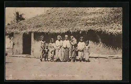 AK Colombo, Native children in front of a typical village hut