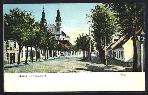 AK Maria Lanzendorf, Strassenpartie mit Kirche