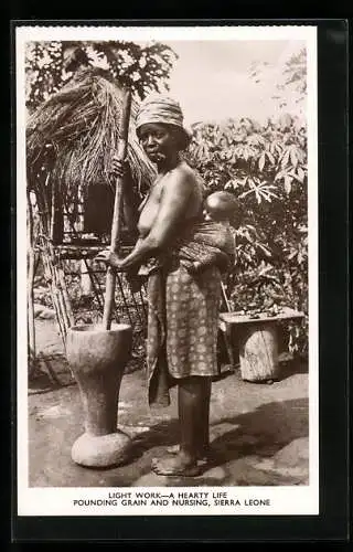 AK Sierra Leone, African Woman with her child, pounding grain and nursing