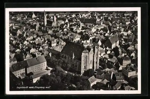 AK Ingolstadt, Ortsansicht mit der Kirche, Fliegeraufnahme