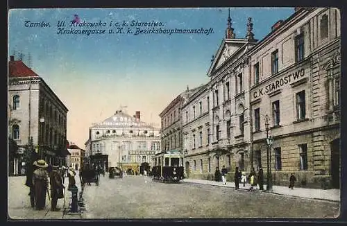 AK Tarnów, Strasse Krakauergasse und K. k. Bezirkshauptmannschaft mit Strassenbahn