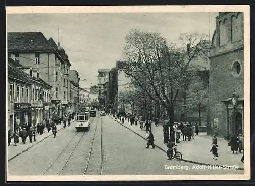 AK Bromberg, Strasse mit Strassenbahnen und Kirche