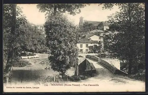 AK Solignac, Vue d`ensemble avec pont et maisons entourées d`arbres