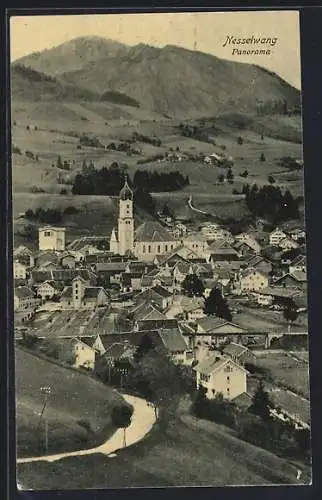 AK Nesselwang, Stadt aus der Vogelschau mit Berglandschaft