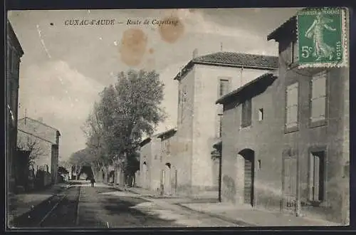 AK Cuxac-d`Aude, Route de Capestang avec des maisons et des arbres