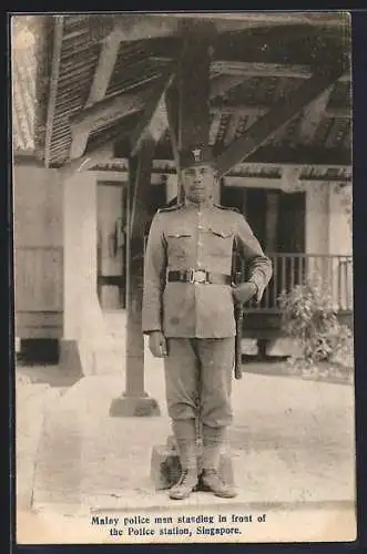 AK Singapore, Malay police man standing in front of the Police station