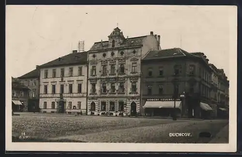 AK Dunchov, Platz mit Geschäft von Robert Feuerstein