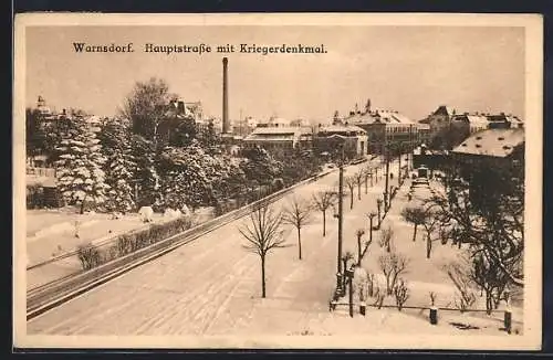 AK Warnsdorf, Hauptstrasse mit Kriegerdenkmal im Winter