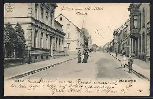 AK Ohligs, Rathausstrasse mit Geschäftshaus Edmund Weck, Damen mit Schirmen