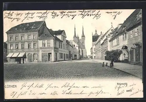 AK Cöthen, Holzmarkt mit Gasthof zum weissen Ross, Handlung Heinrich Hendler, Buchhandlung u. Kirche