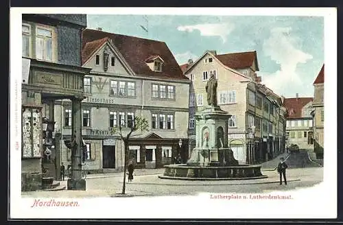 AK Nordhausen, Riesenhaus Fr. Kaatz am Lutherplatz mit Lutherdenkmal